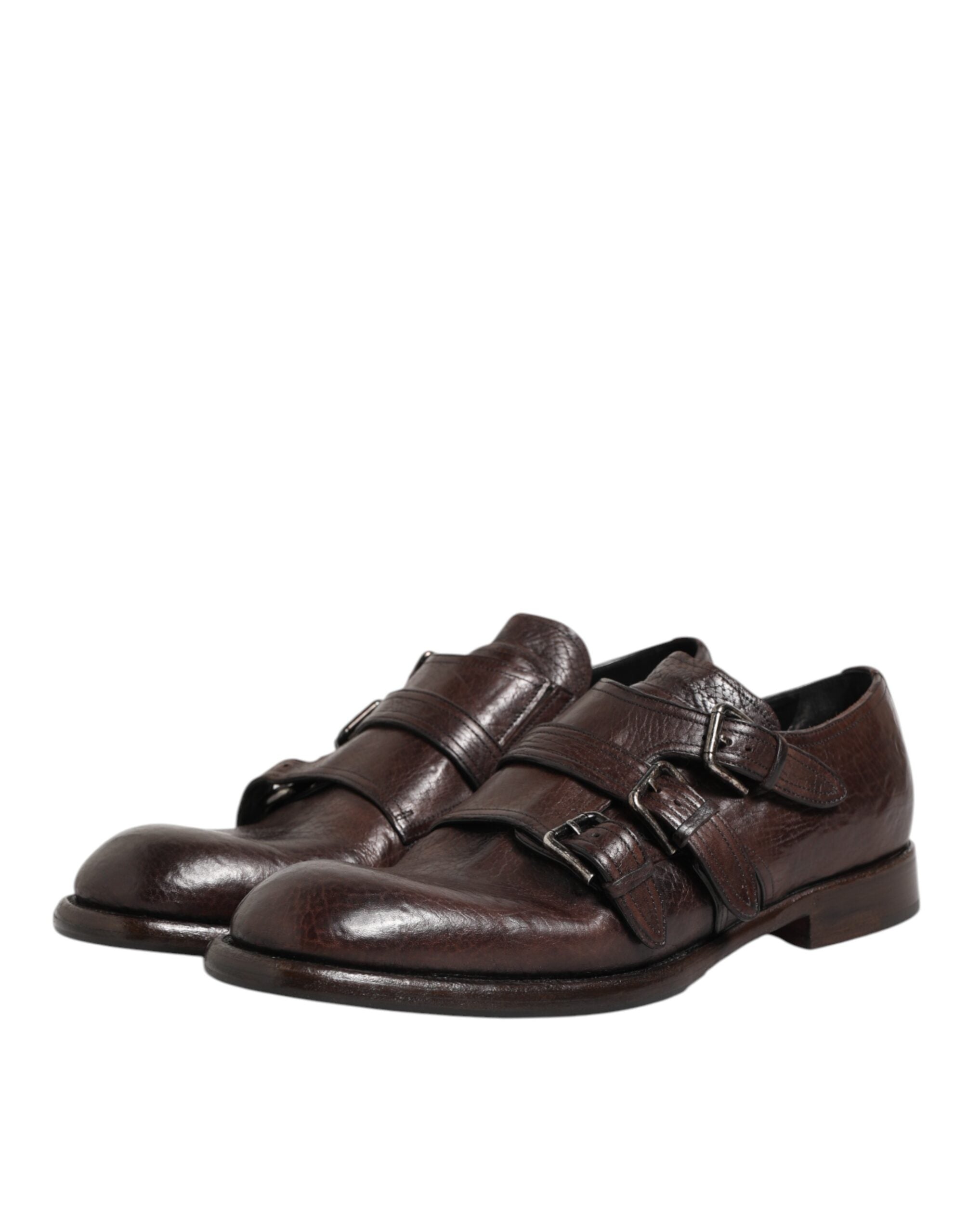 Chaussures Derby formelles en cuir marron avec boucle monk strap de Dolce & Gabbana, élégantes et sophistiquées pour homme.