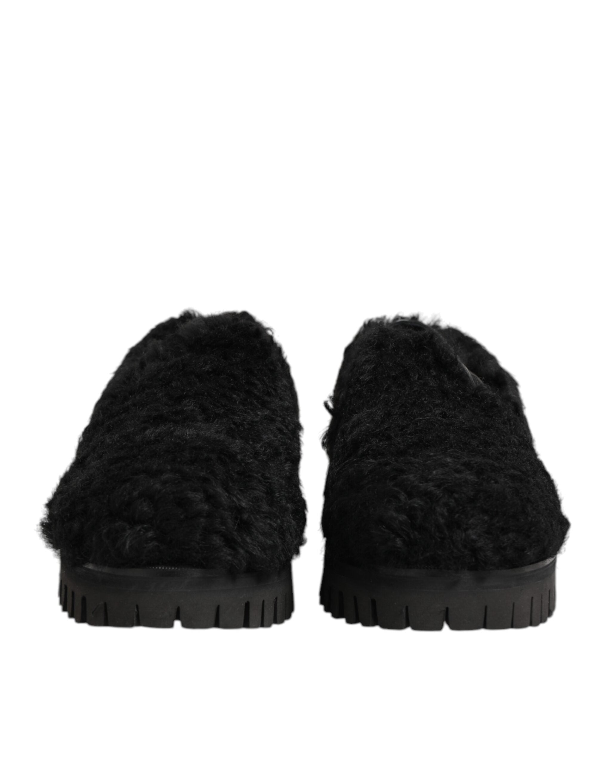Chaussures homme Dolce & Gabbana, slippers noires en cuir avec fourrure, élégantes et confortables.