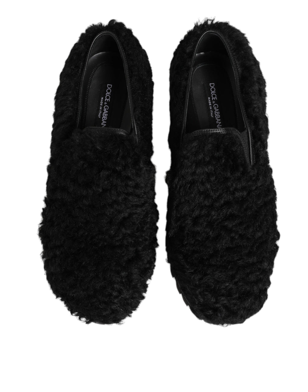 Chaussures hommes Dolce & Gabbana, slippers noires en cuir et fourrure, design élégant et confortable.