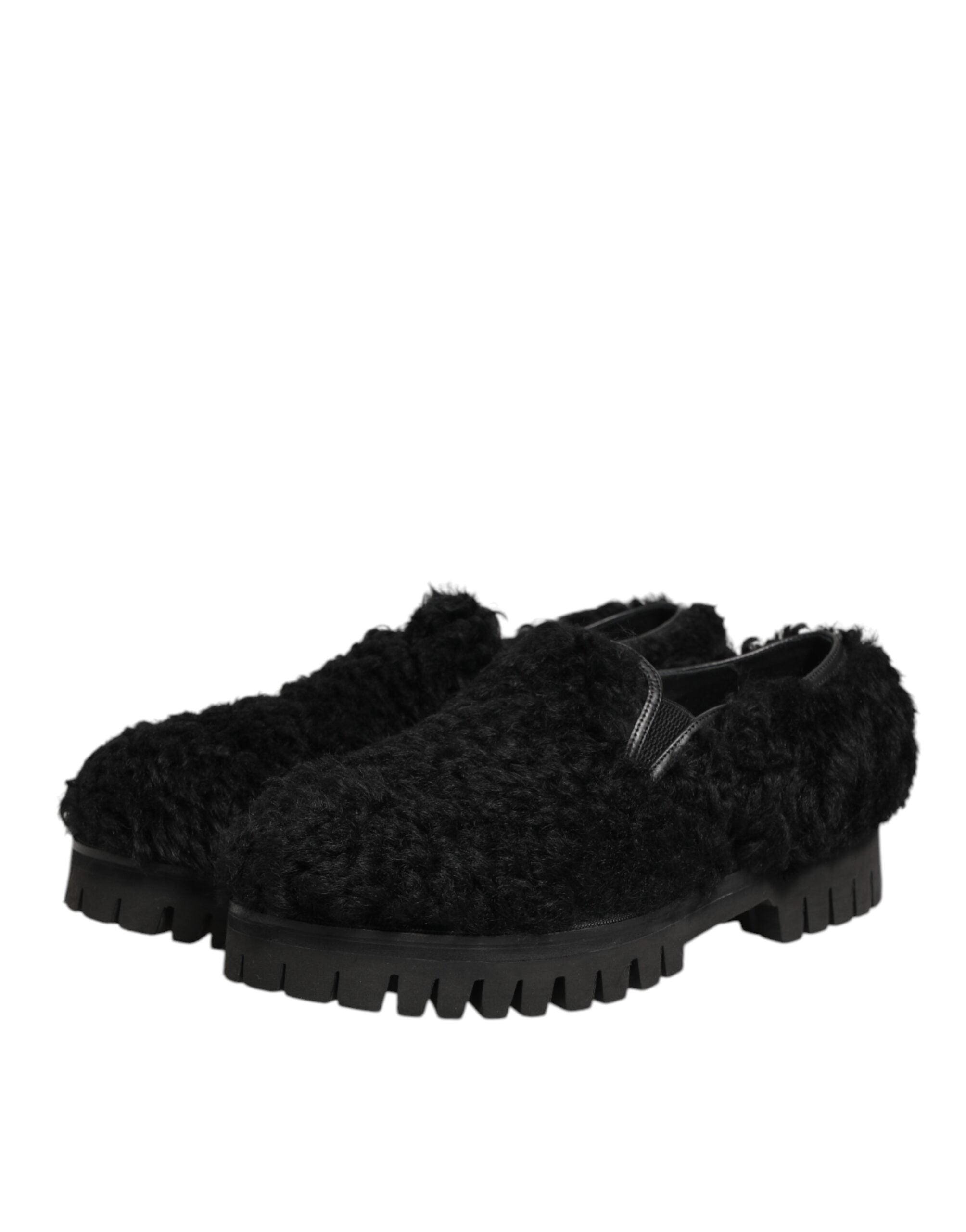 Chaussures pour hommes Dolce & Gabbana, slippers noires en fourrure et cuir, élégantes et sophistiquées.