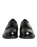 Chaussures Derby formelles en cuir noir pour homme de Dolce & Gabbana, ornées de clous et de détails élégants.