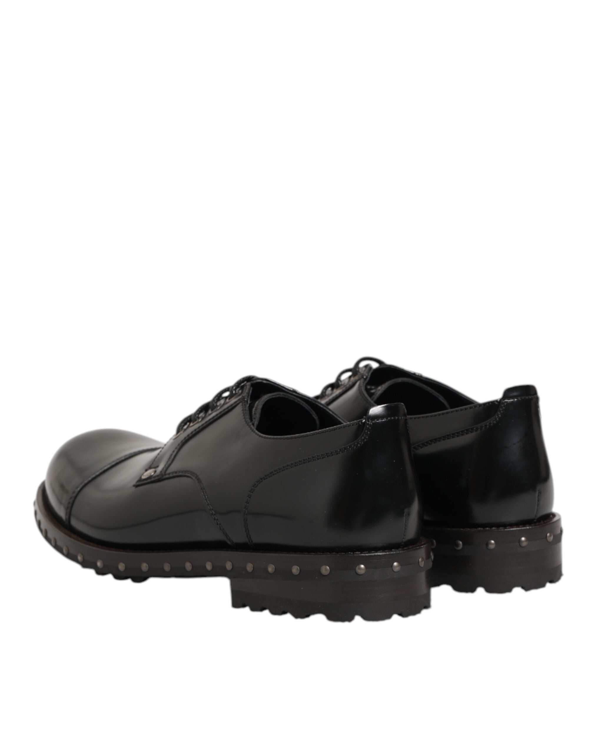 Chaussures Derby formelles en cuir noir Dolce & Gabbana pour homme avec studs, élégantes et sophistiquées.