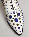 Chaussures habillées en cuir blanc Dolce & Gabbana ornées de cristaux, élégantes et sophistiquées.