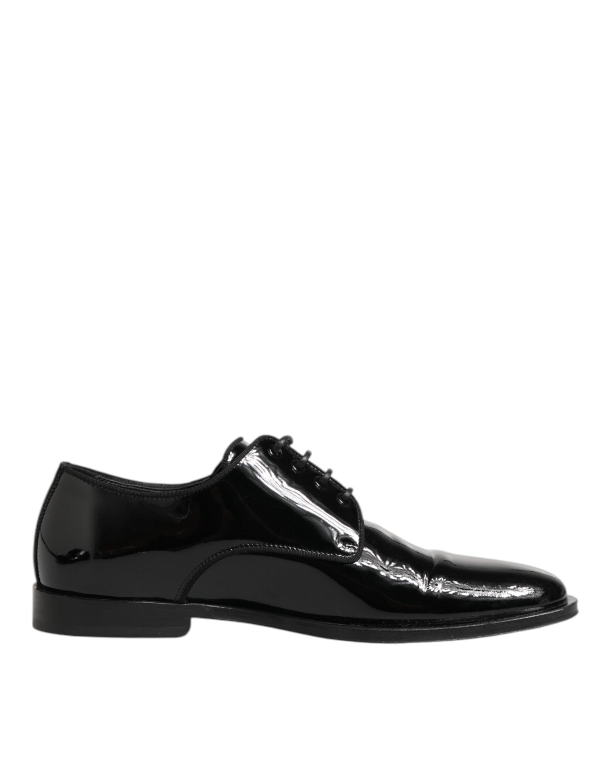 Chaussures Derby formelles en cuir noir Dolce & Gabbana avec lacets, élégantes et sophistiquées pour homme.