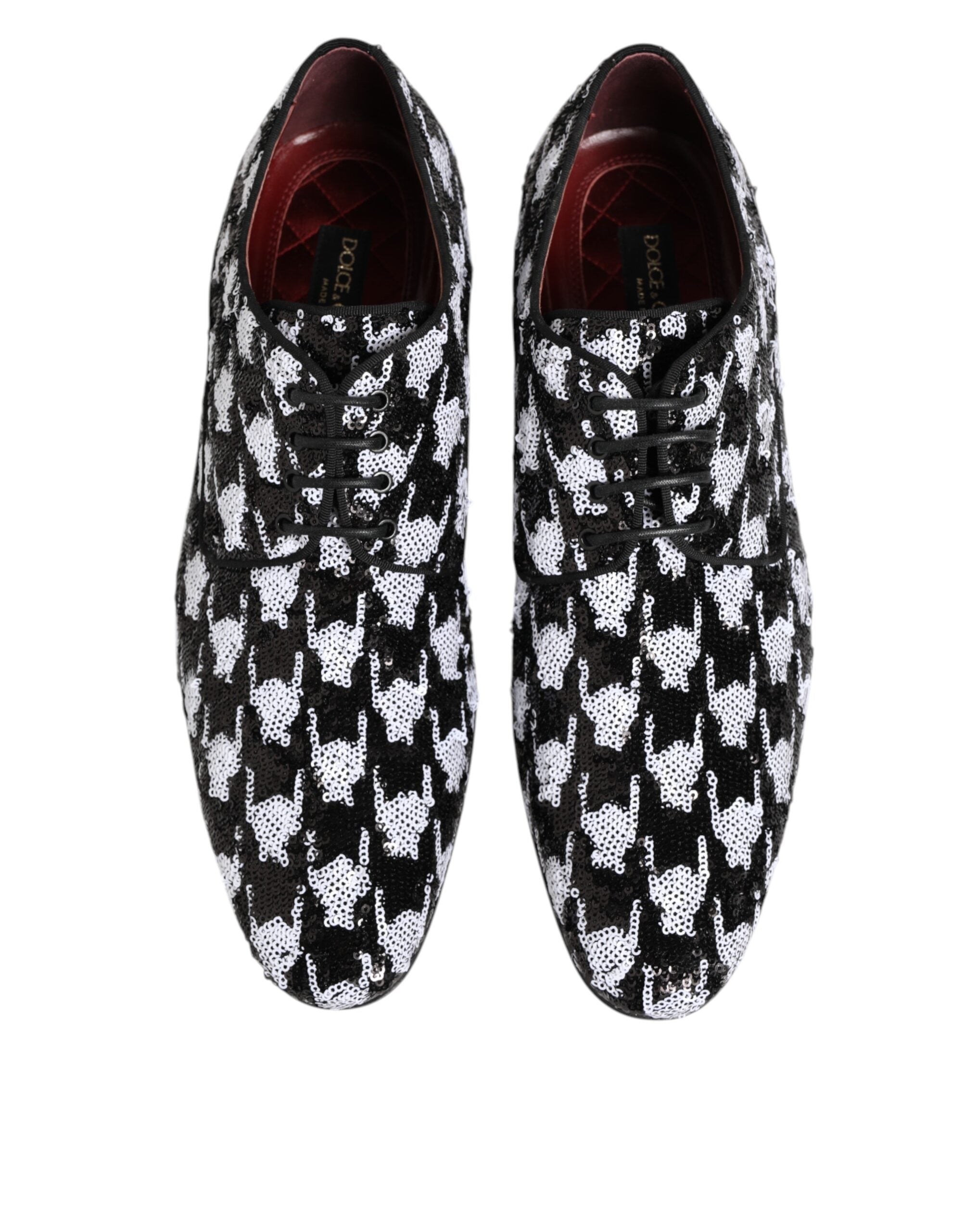 Chaussures derby Dolce & Gabbana noires et blanches avec sequins et lacets, style élégant et sophistiqué.