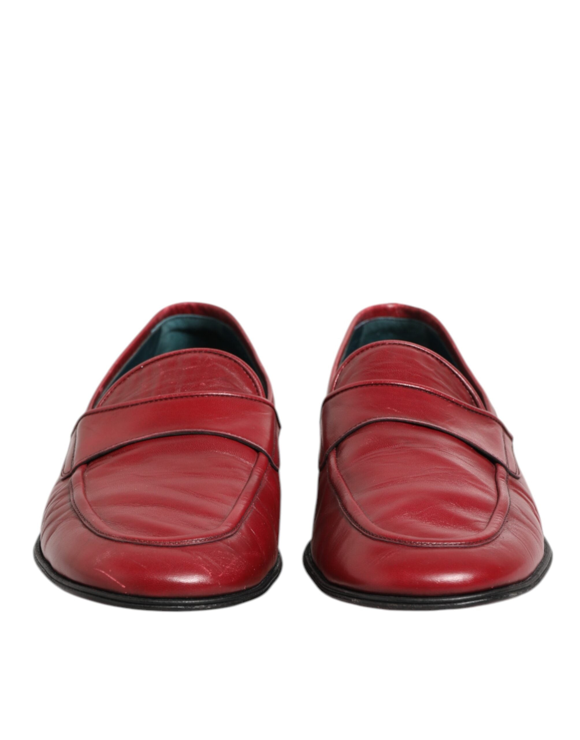 Chaussures mocassins en cuir rouge Dolce & Gabbana pour hommes, style slip-on, élégantes et confortables.