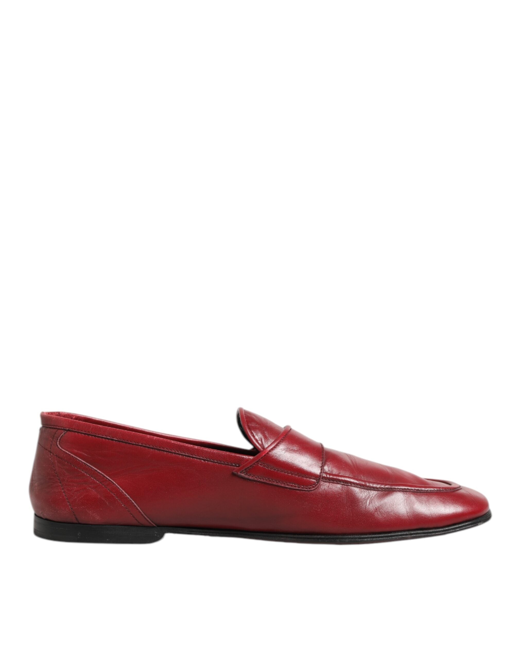 Mocassins homme Dolce & Gabbana en cuir rouge, slip-on élégants, avec finition raffinée et semelle en caoutchouc.