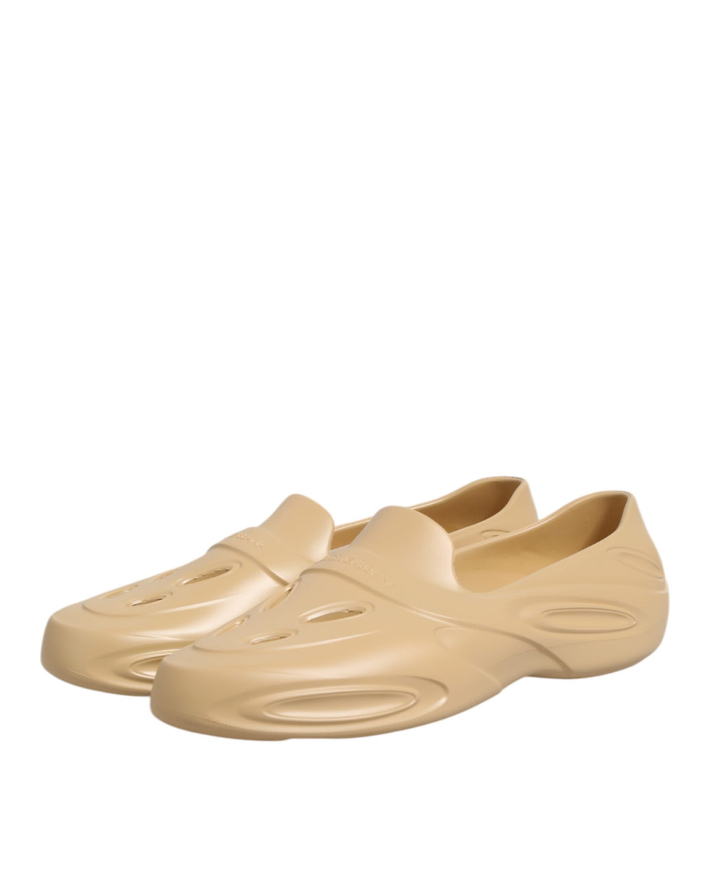 Chaussures Dolce & Gabbana en caoutchouc beige, baskets basses élégantes avec semelle confortable et design moderne.
