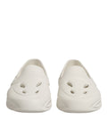 Chaussures Dolce & Gabbana en caoutchouc blanc, baskets basses modernes avec semelle confortable et design élégant.