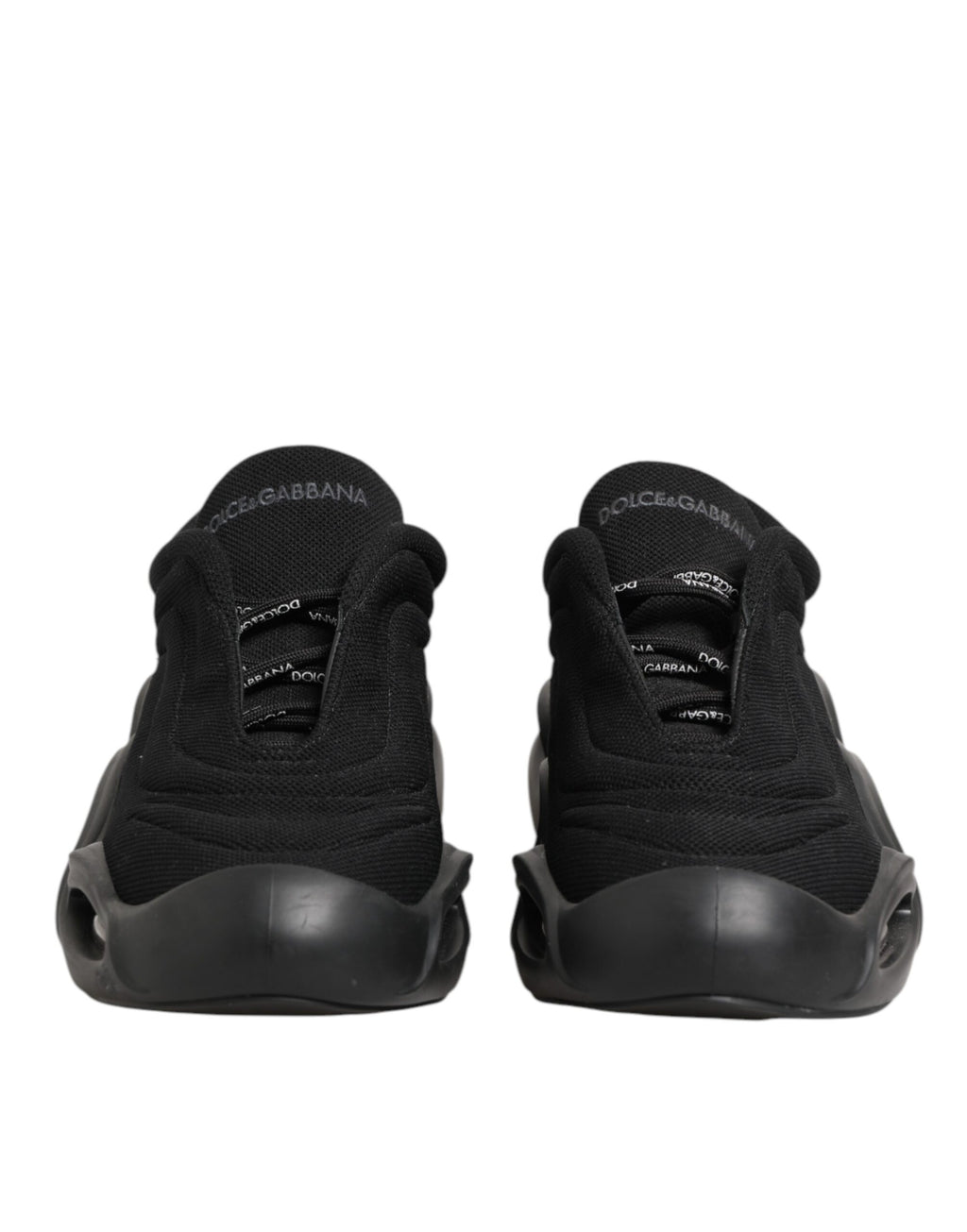 Chaussures sneakers basses Dolce & Gabbana pour homme en dentelle noire avec laçage en forme de vague, vue de face.
