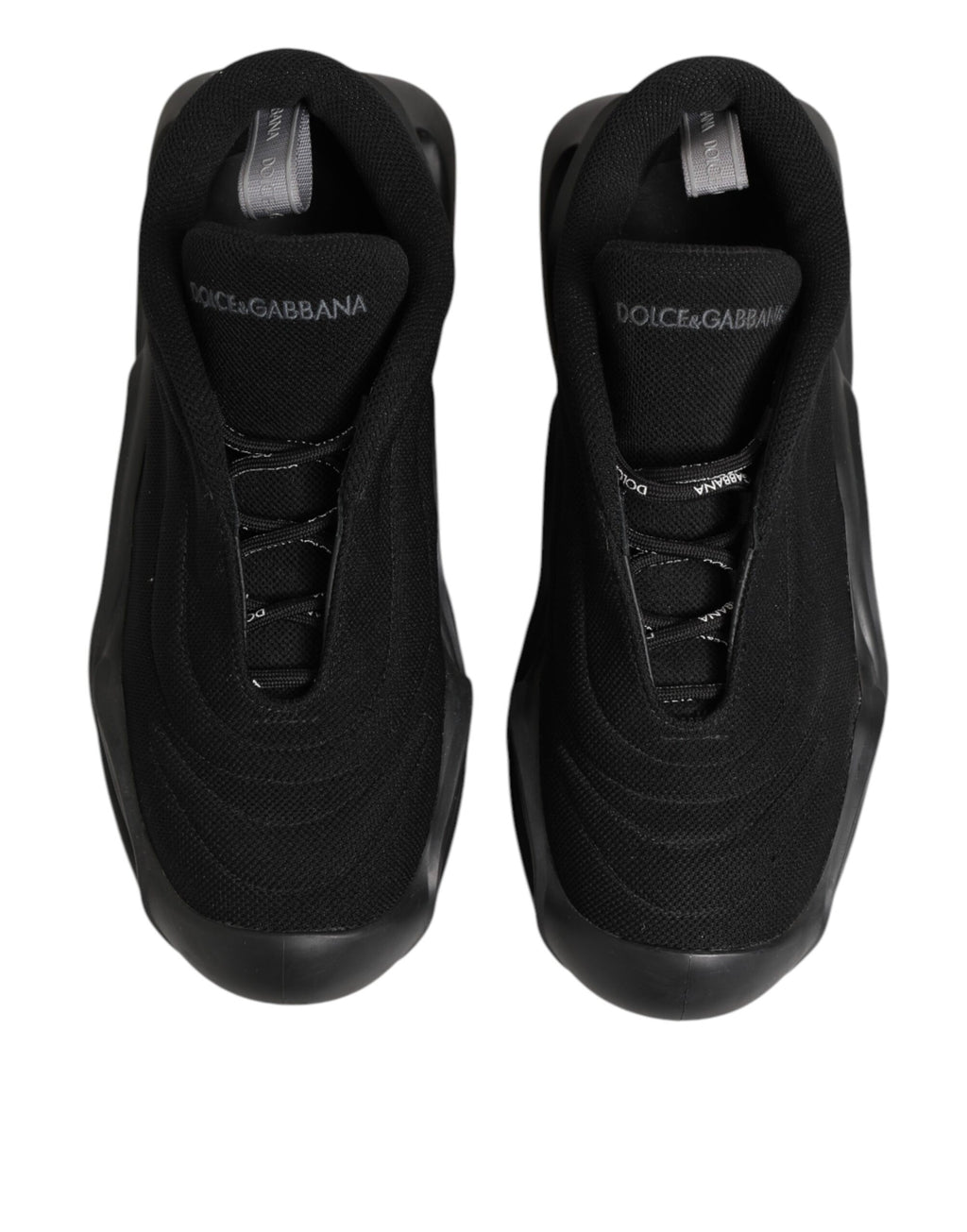 Chaussures basses Dolce & Gabbana pour homme, sneakers en dentelle noire avec lacets et motif ondulé.