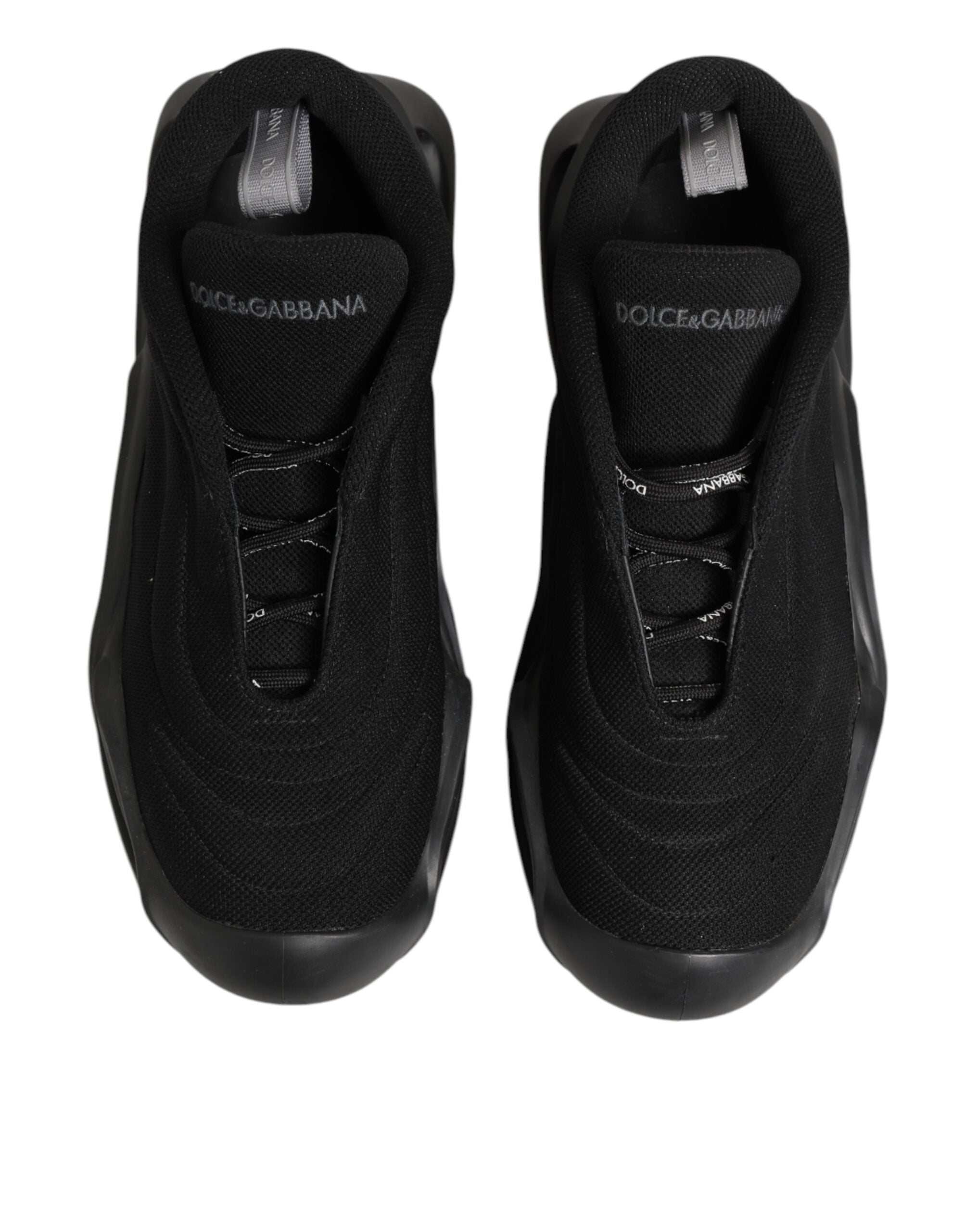 Chaussures basses Dolce & Gabbana pour homme, sneakers en dentelle noire avec lacets et motif ondulé.