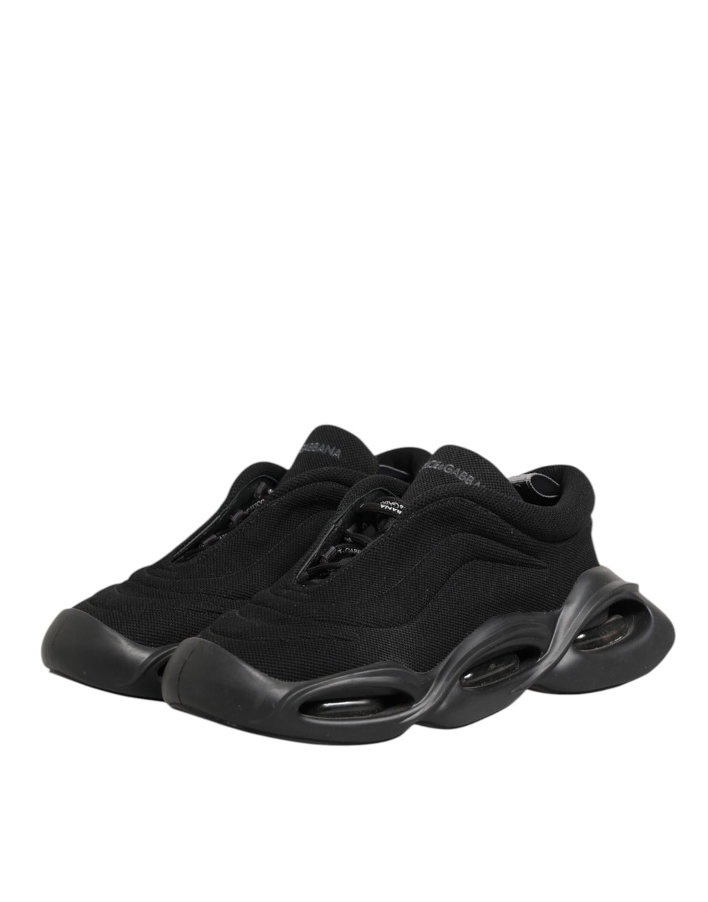 Chaussures sneakers basses Dolce & Gabbana en cuir noir avec lacets, motif ondulé, pour homme, vue de face.