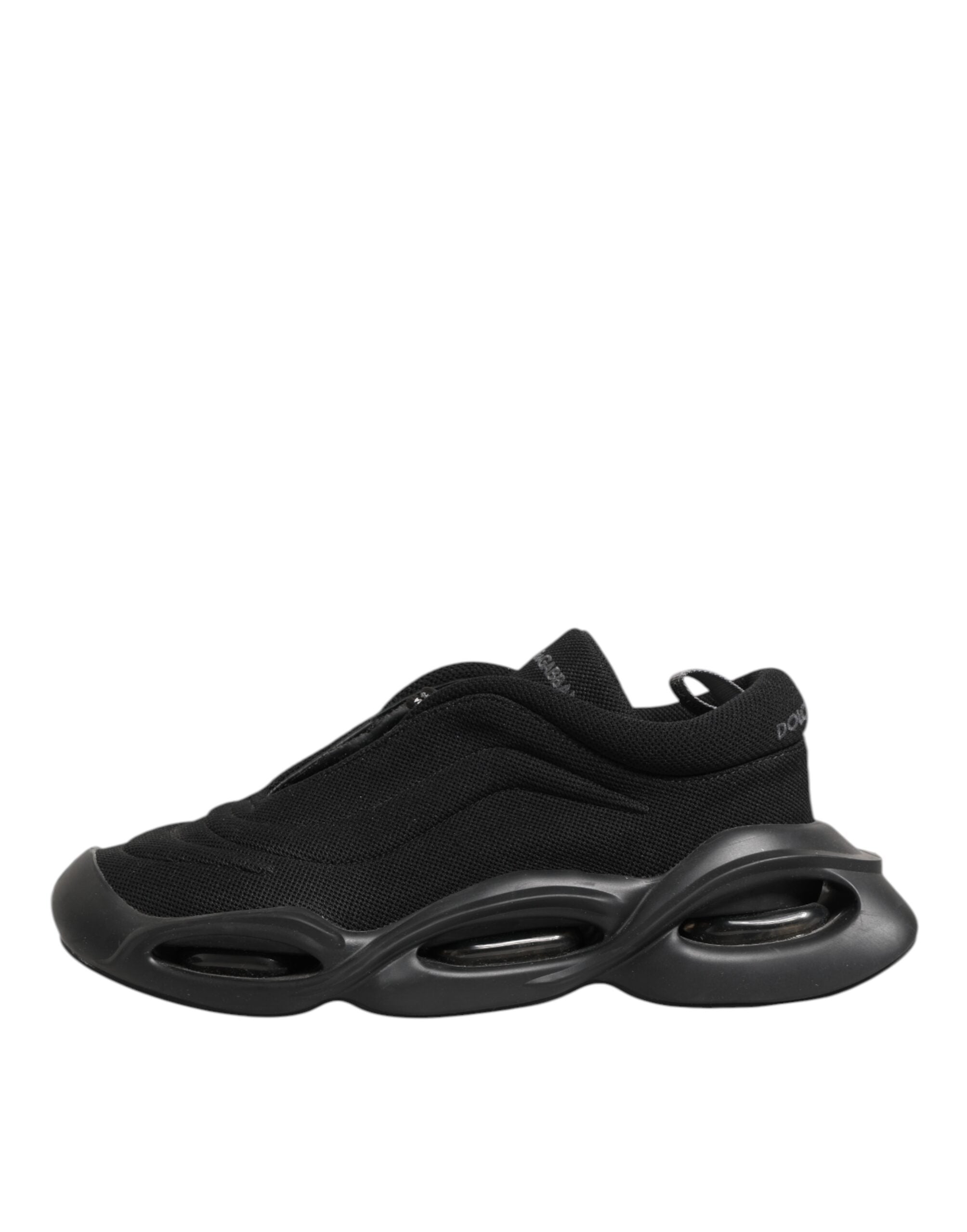 Chaussures de sport basses Dolce & Gabbana en dentelle noire avec lacets, style tendance et design élégant pour hommes.