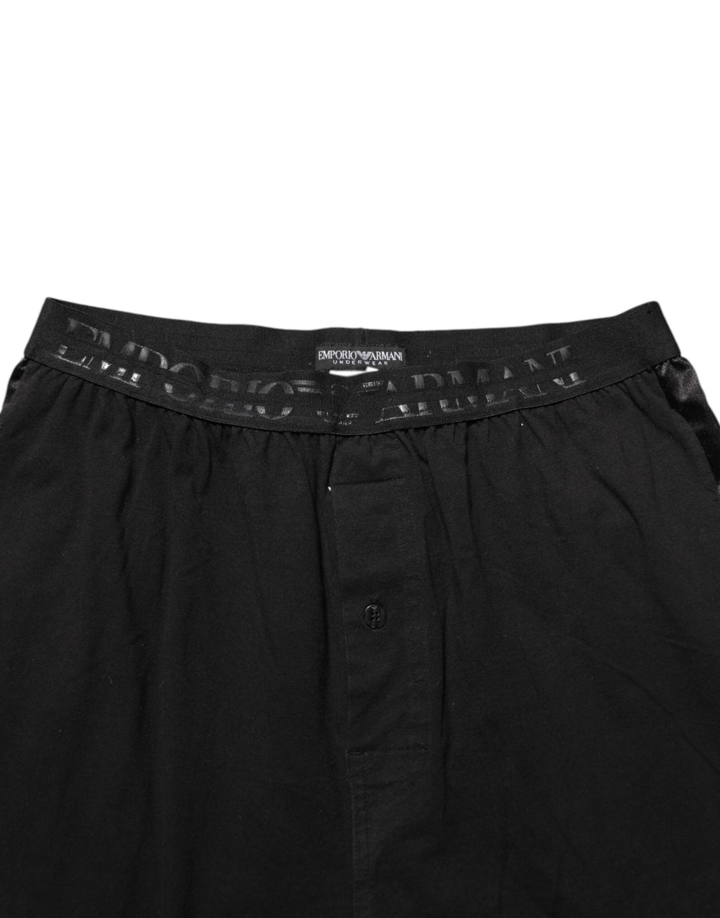Pantalon homme Emporio Armani en coton mélangé noir avec logo sur la ceinture, coupe élégante et moderne.