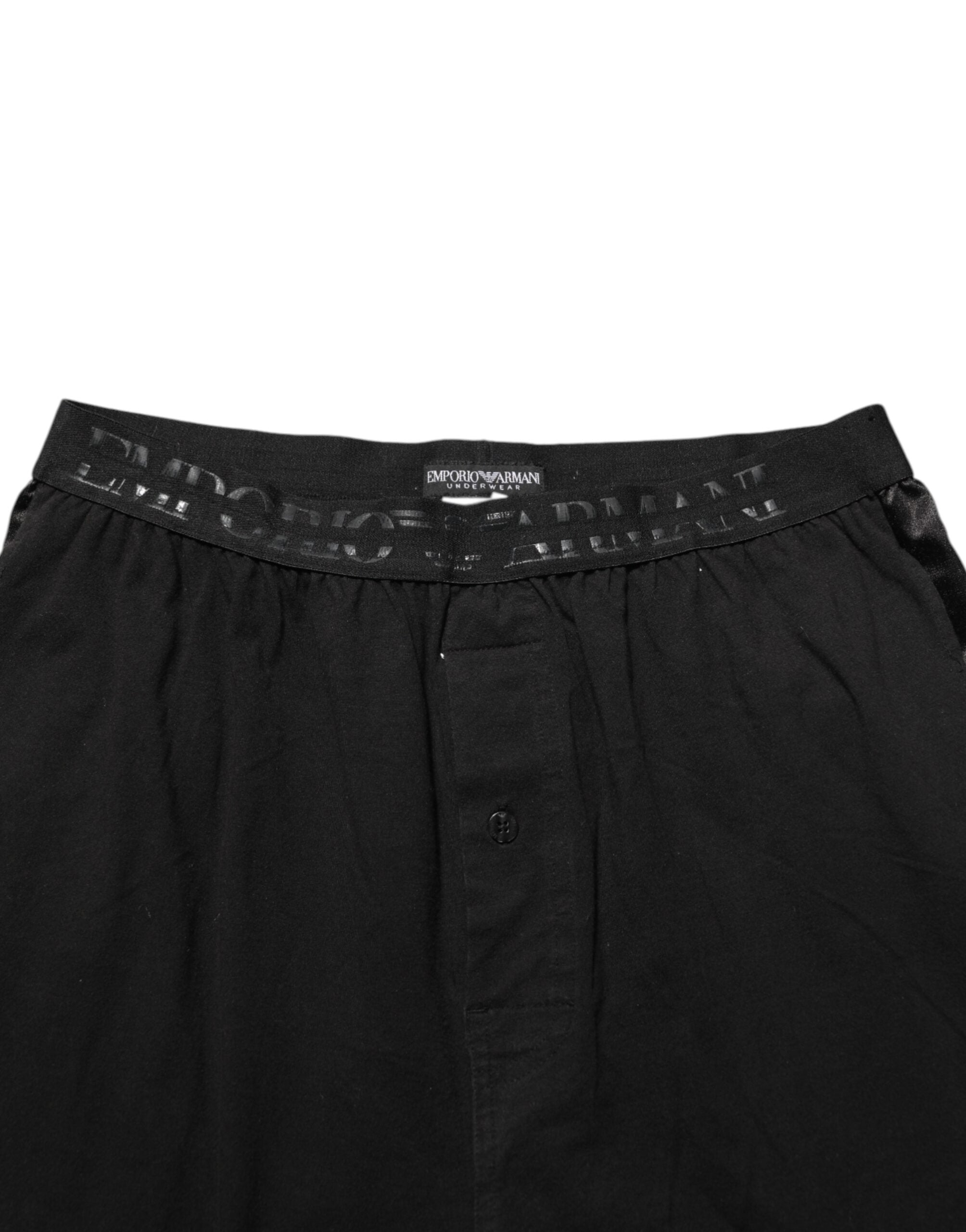 Pantalon homme Emporio Armani en coton mélangé noir avec logo sur la ceinture, coupe élégante et moderne.