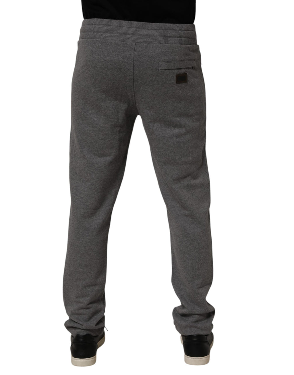 Pantalon jogger en coton gris Dolce & Gabbana pour homme, look décontracté et confortable, avec détails modernes.