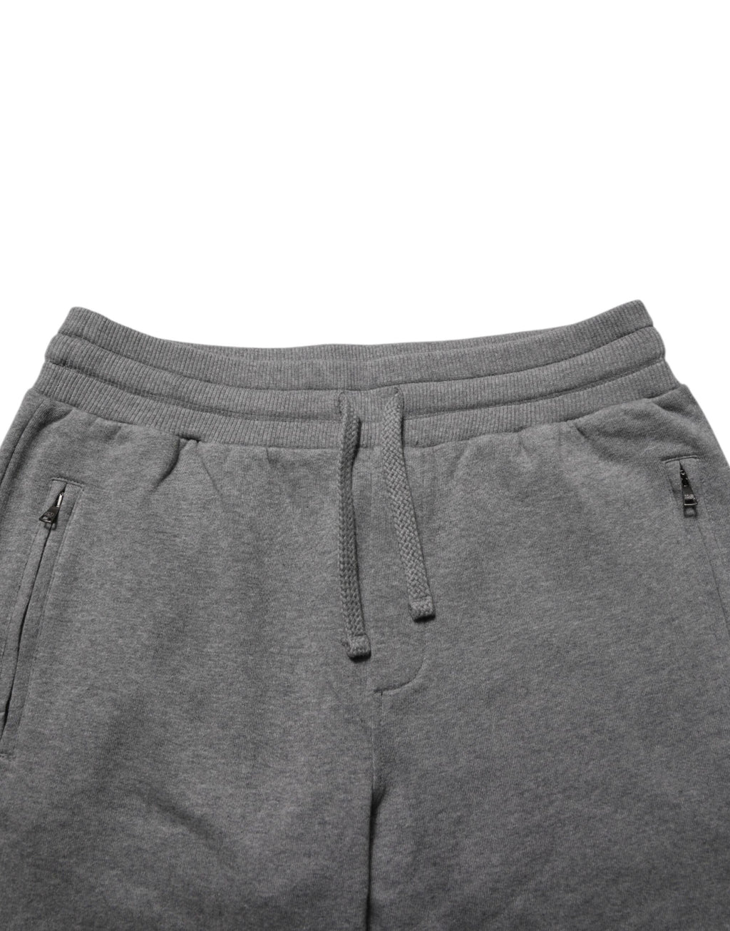 Pantalon de jogging en coton gris Dolce & Gabbana, style décontracté avec poches et taille élastique, pour un look confortable et élégant.