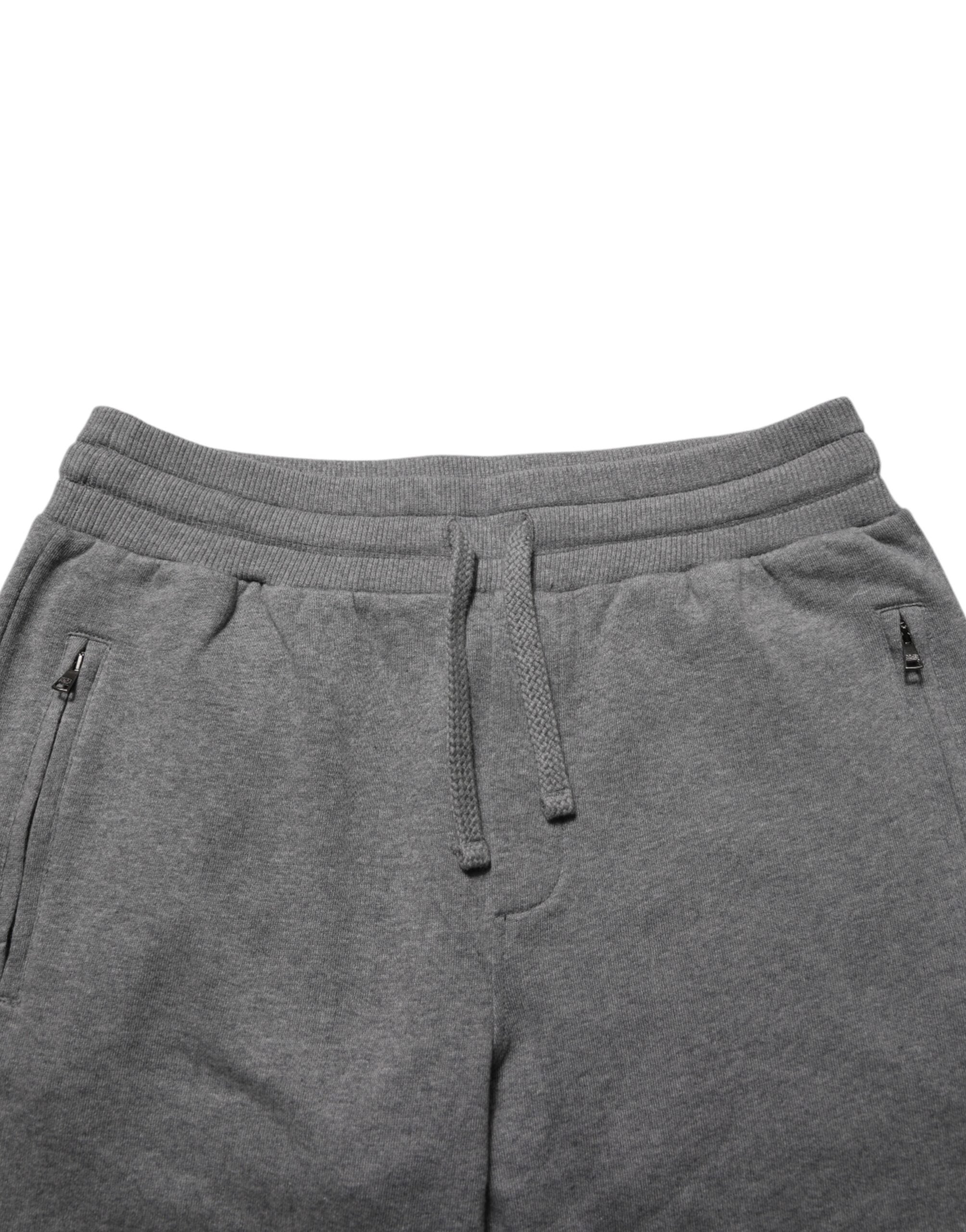 Pantalon de jogging en coton gris Dolce & Gabbana, style décontracté avec poches et taille élastique, pour un look confortable et élégant.