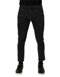 Pantalon en jean Dolce & Gabbana gris foncé en coton stretch, coupe classique avec poches avant et ceinture à boucle.