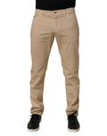 Jeans homme Dolce & Gabbana en coton beige skinny regular, denim avec fermeture éclair et poches avant.