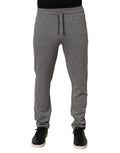 Pantalon de jogging en coton gris Dolce & Gabbana, style décontracté avec taille élastique et poches latérales.