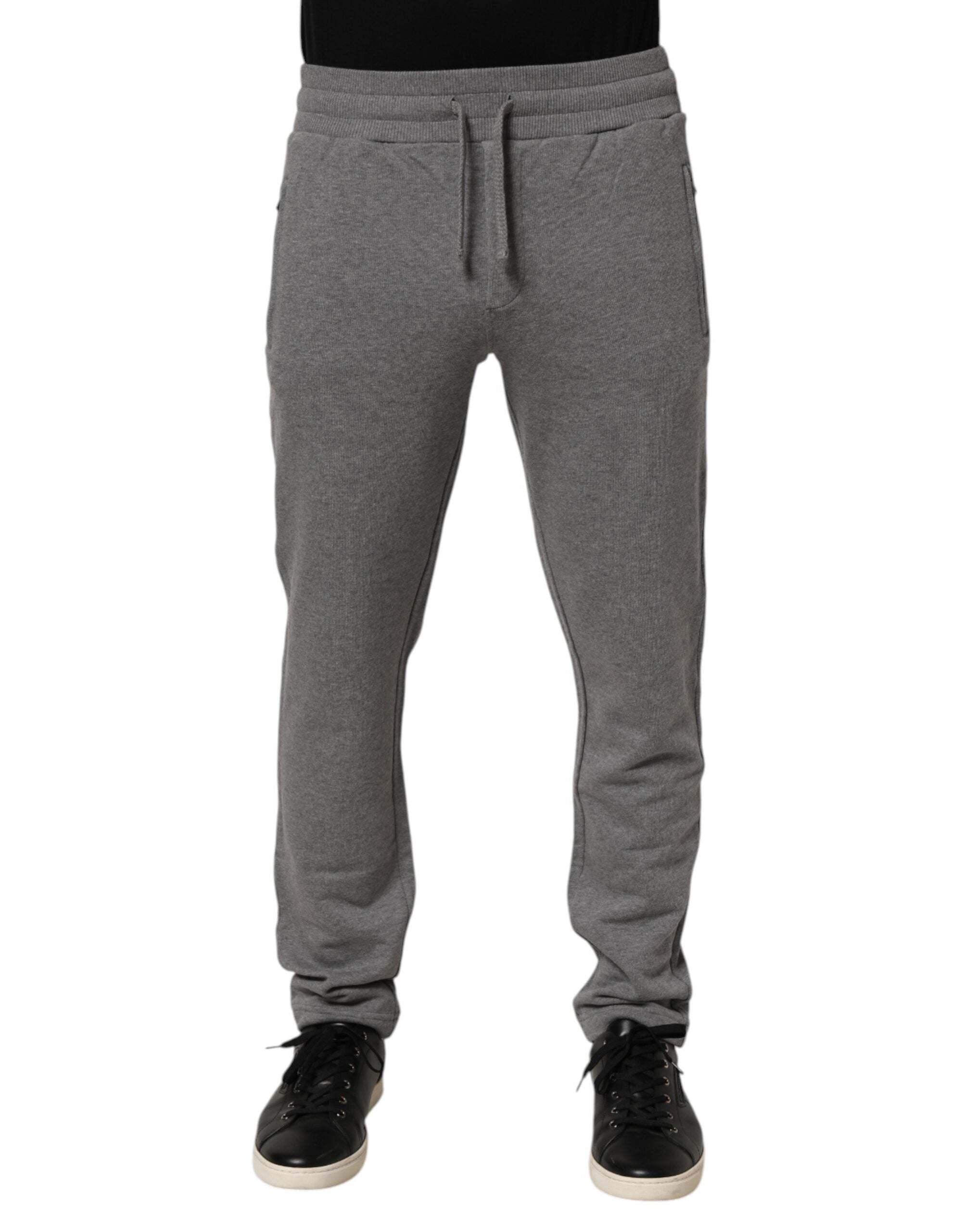 Pantalon de jogging en coton gris Dolce & Gabbana, style décontracté avec taille élastique et poches latérales.