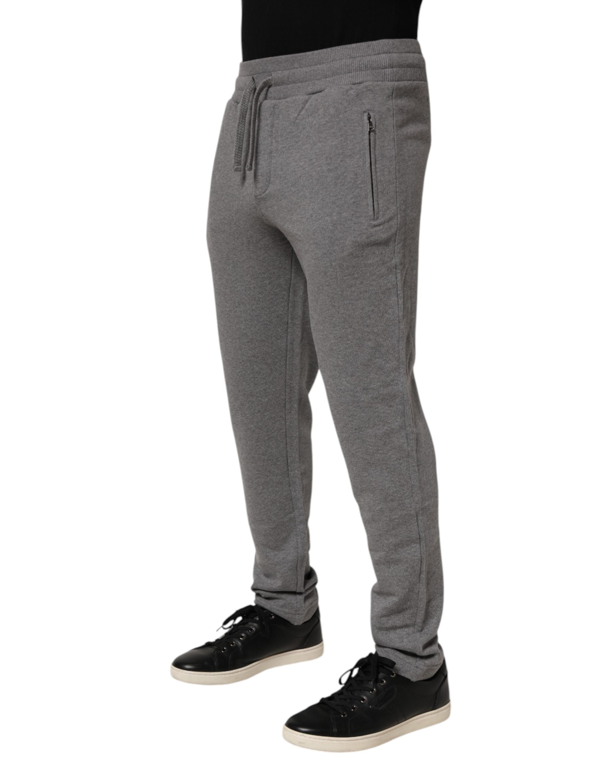 Pantalon de jogging en coton gris Dolce & Gabbana, style décontracté, avec ceinture élastique et poches latérales.