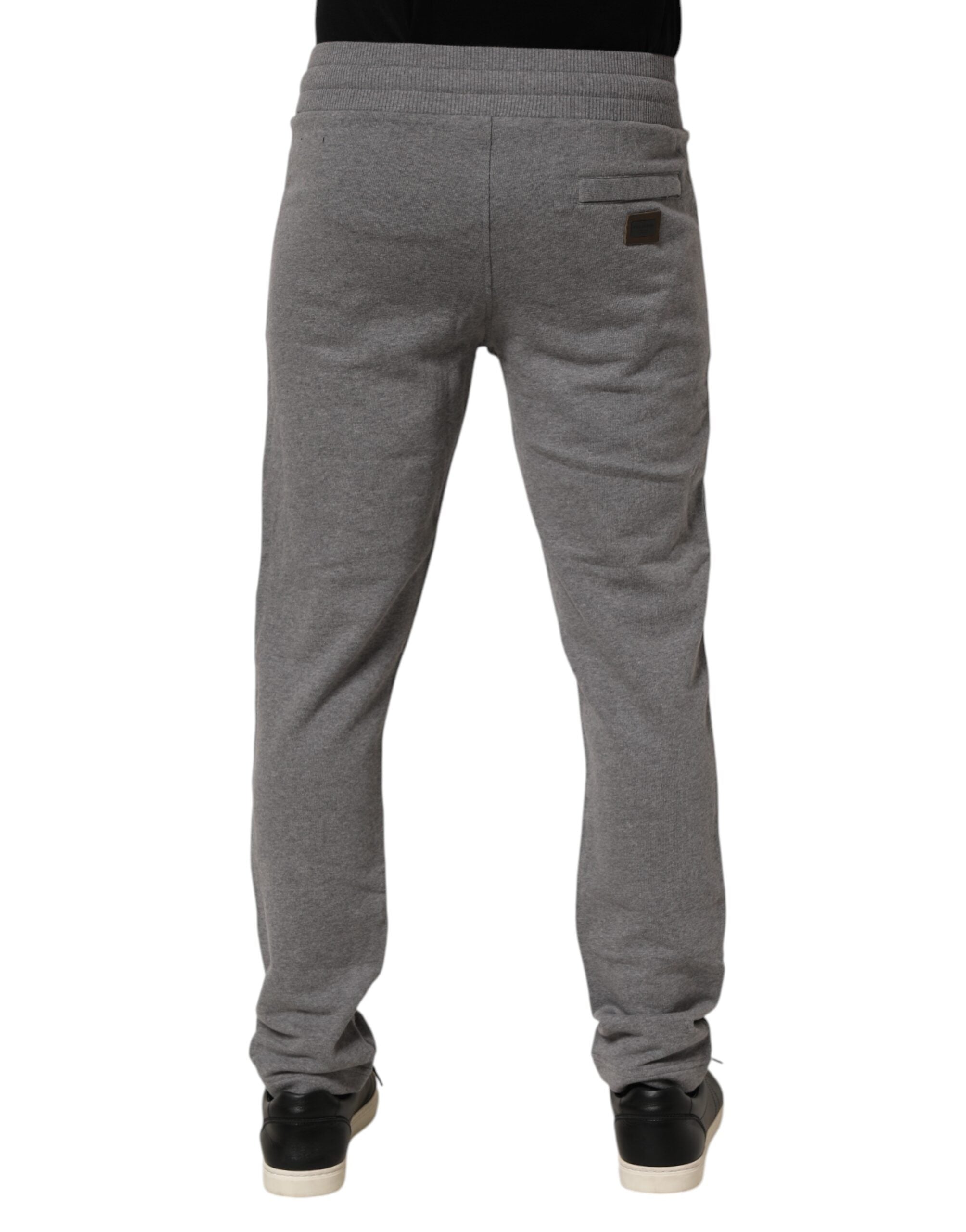 Pantalon jogger en coton gris Dolce & Gabbana, pantalon décontracté avec ceinture élastique et poches latérales.