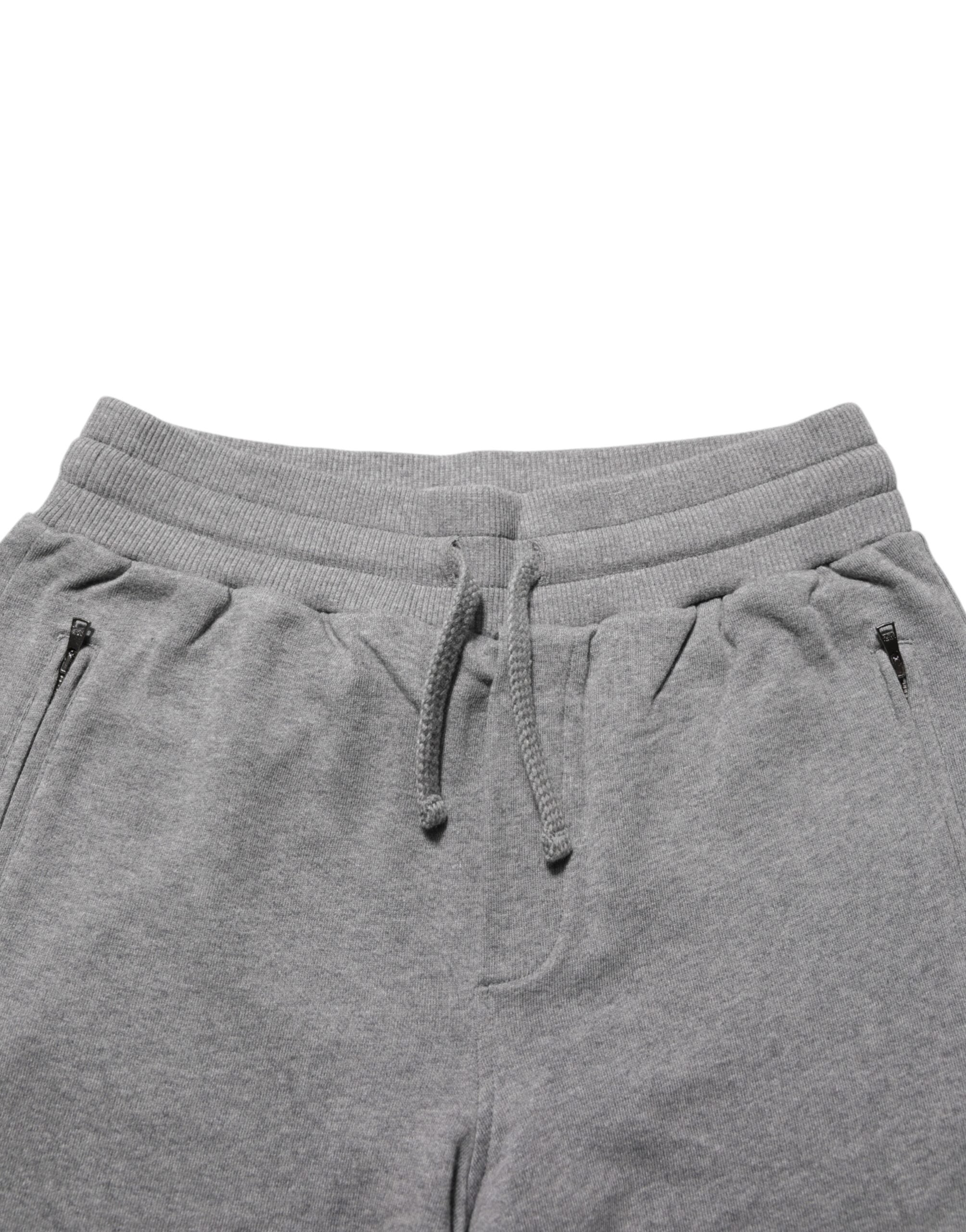 Pantalon de jogging en coton gris Dolce & Gabbana, style décontracté et confortable, avec ceinture élastique et poches latérales.