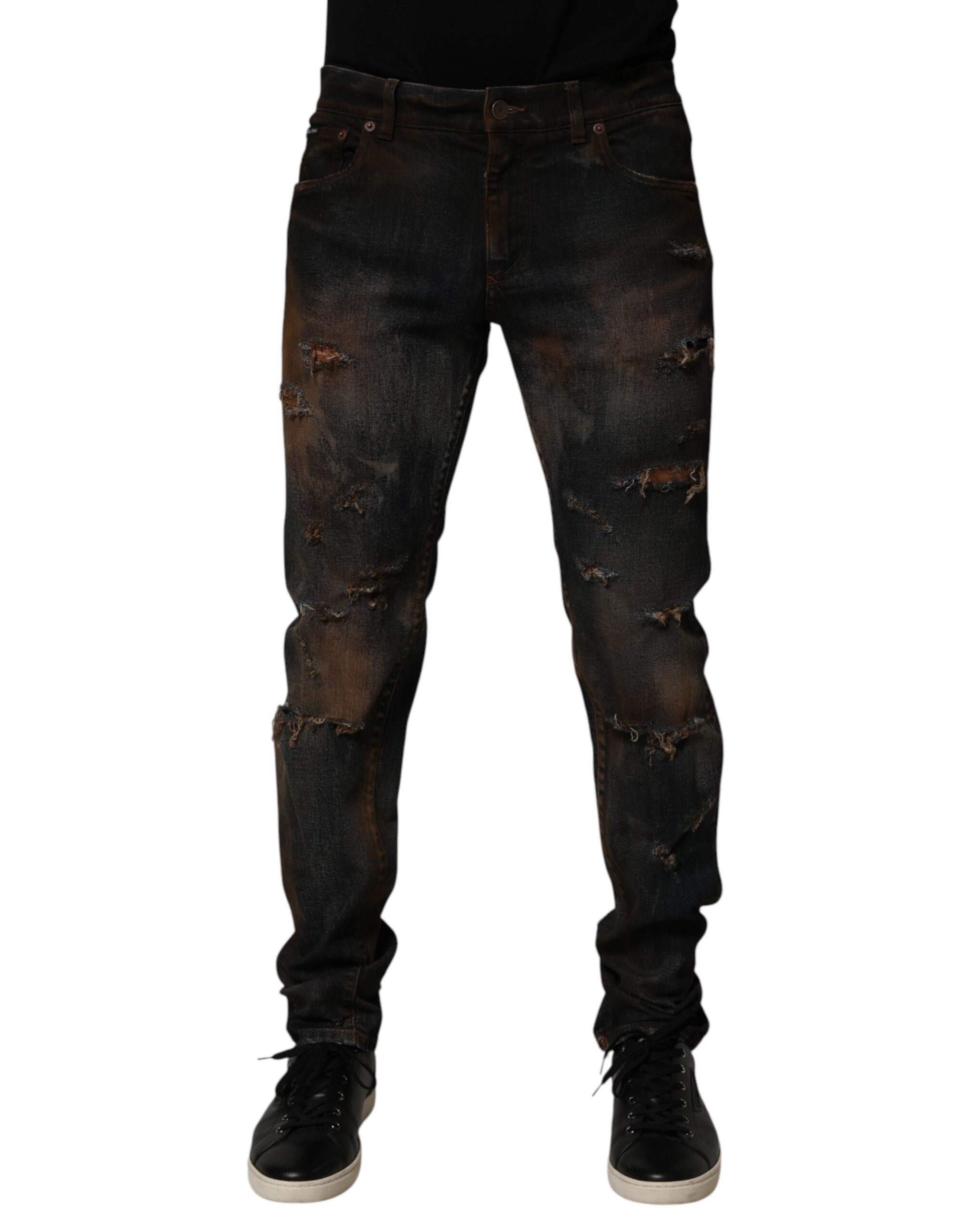 Jeans skinny en coton noir de Dolce & Gabbana avec déchirures et détails tachetés pour hommes, denim tendance et élégant.