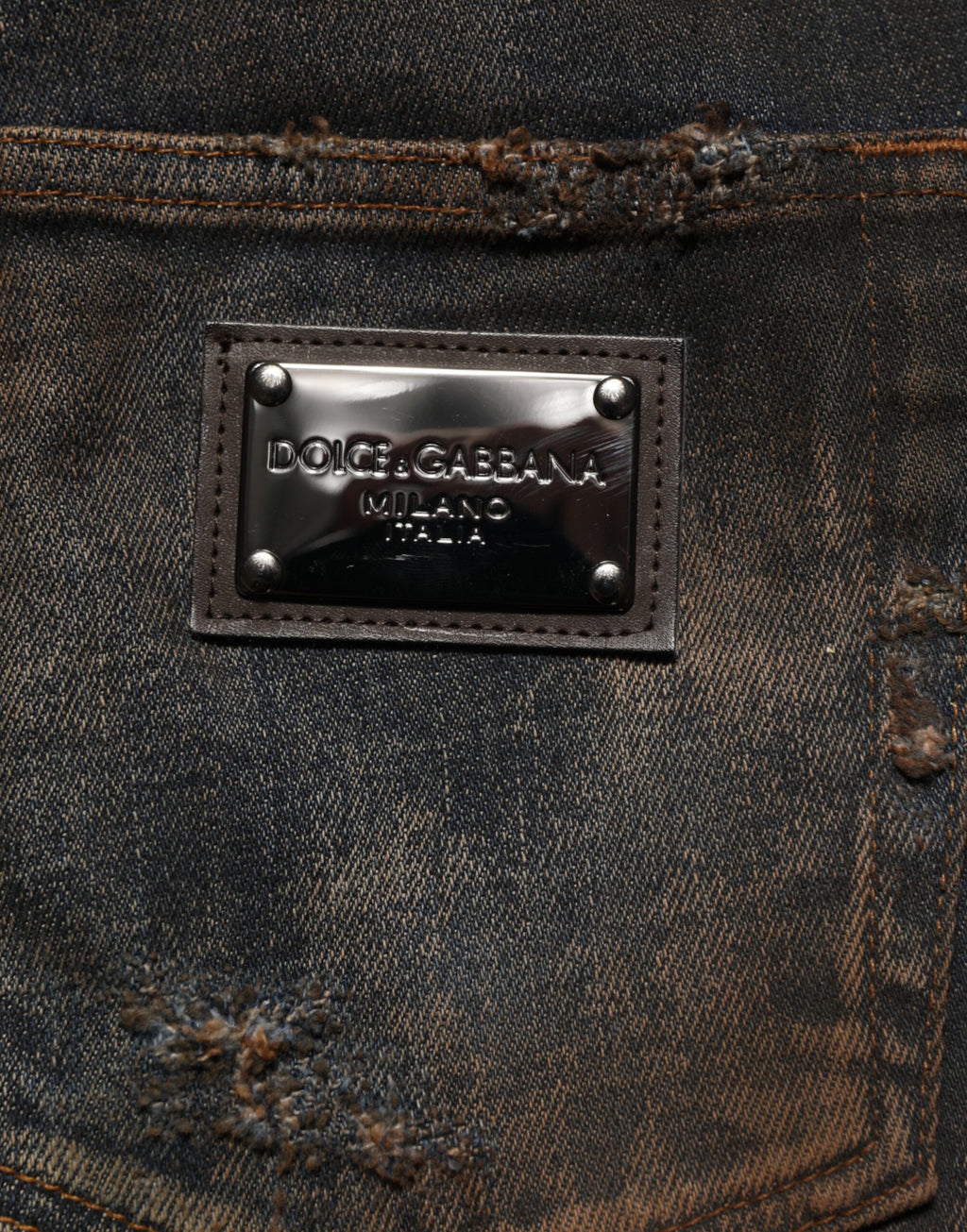 Pantalons en jean skinny noir pour homme de Dolce & Gabbana, coton tissé avec déchirures et détails usés.