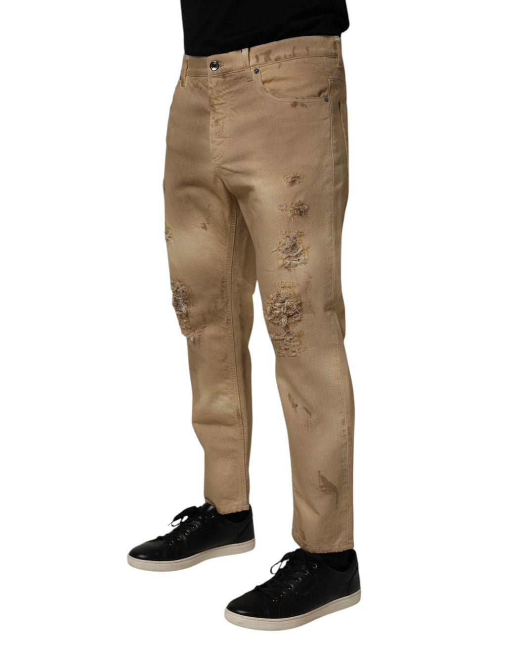 Jeans homme en denim beige déchiré de Dolce & Gabbana, coupe ample en coton, style décontracté et tendance.