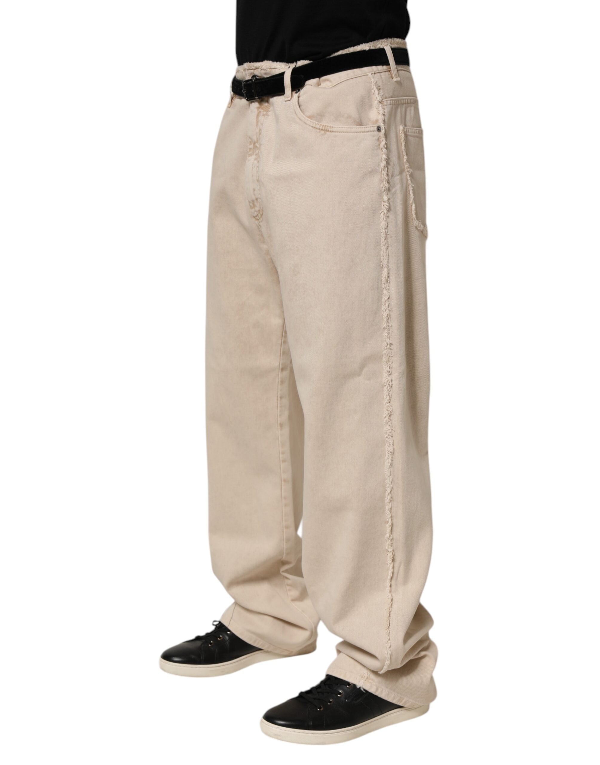 Pantalon en denim beige Dolce & Gabbana en coton, coupe droite, pour homme, visible avec détails de couture et poches.