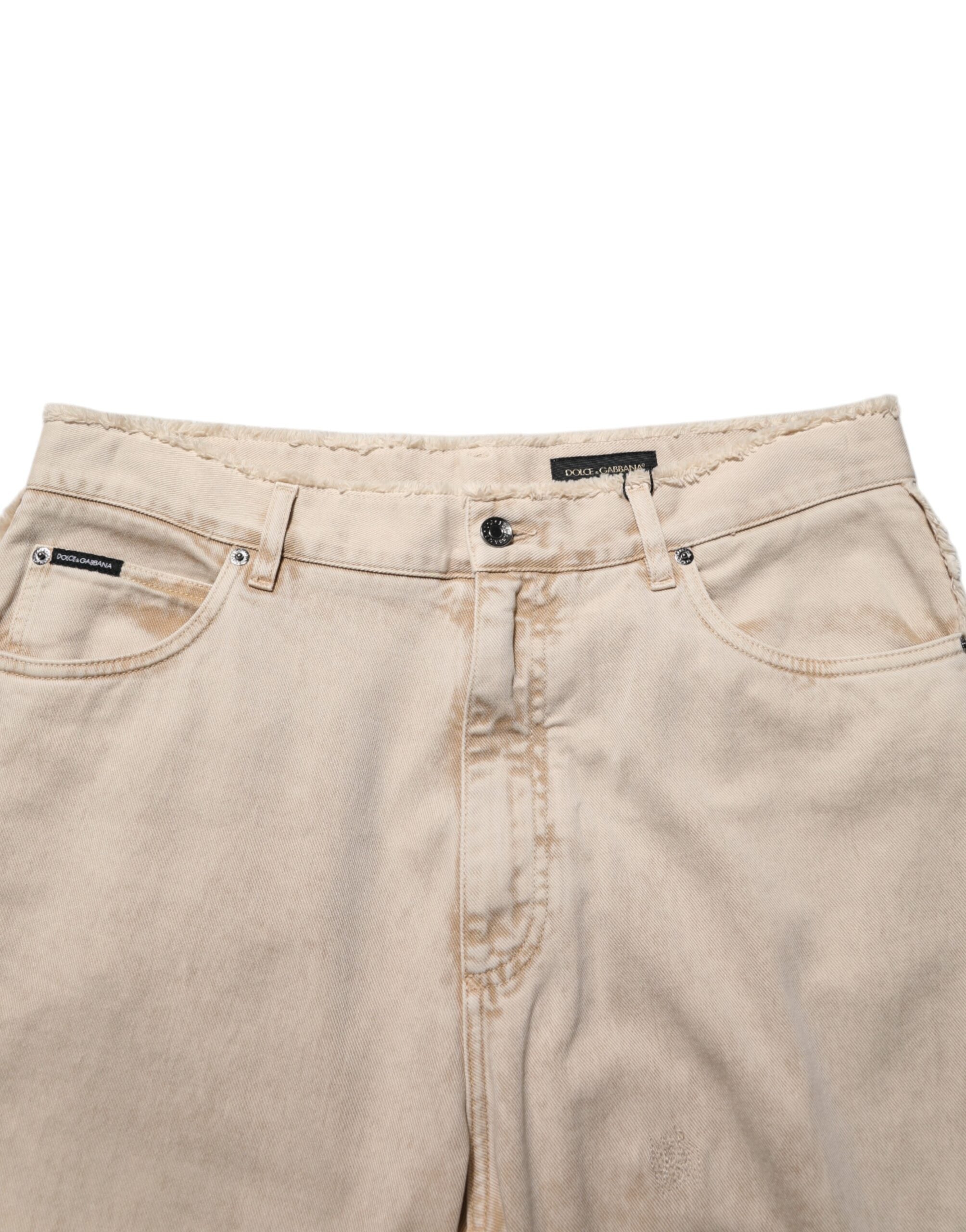 Pantalon en jean droit en coton beige de Dolce & Gabbana, style classique et élégant, visible en image.