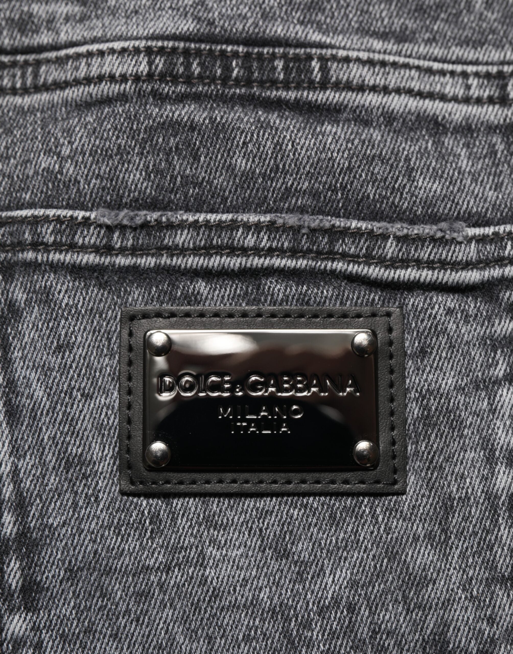 Pantalon en jean gris Dolce & Gabbana, coupe slim en coton, visible avec fermeture éclair et poches avant.
