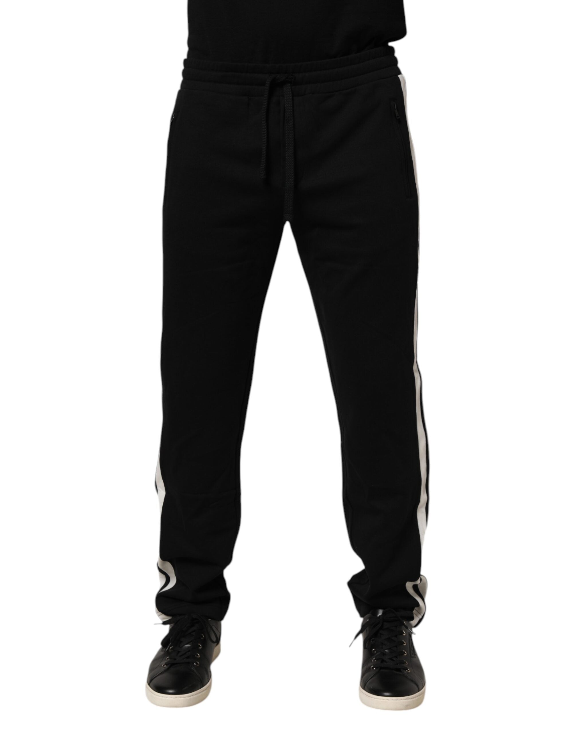 Pantalon jogging en coton noir de Dolce & Gabbana, style décontracté avec élastiques à la taille et aux poignets, tissu doux.
