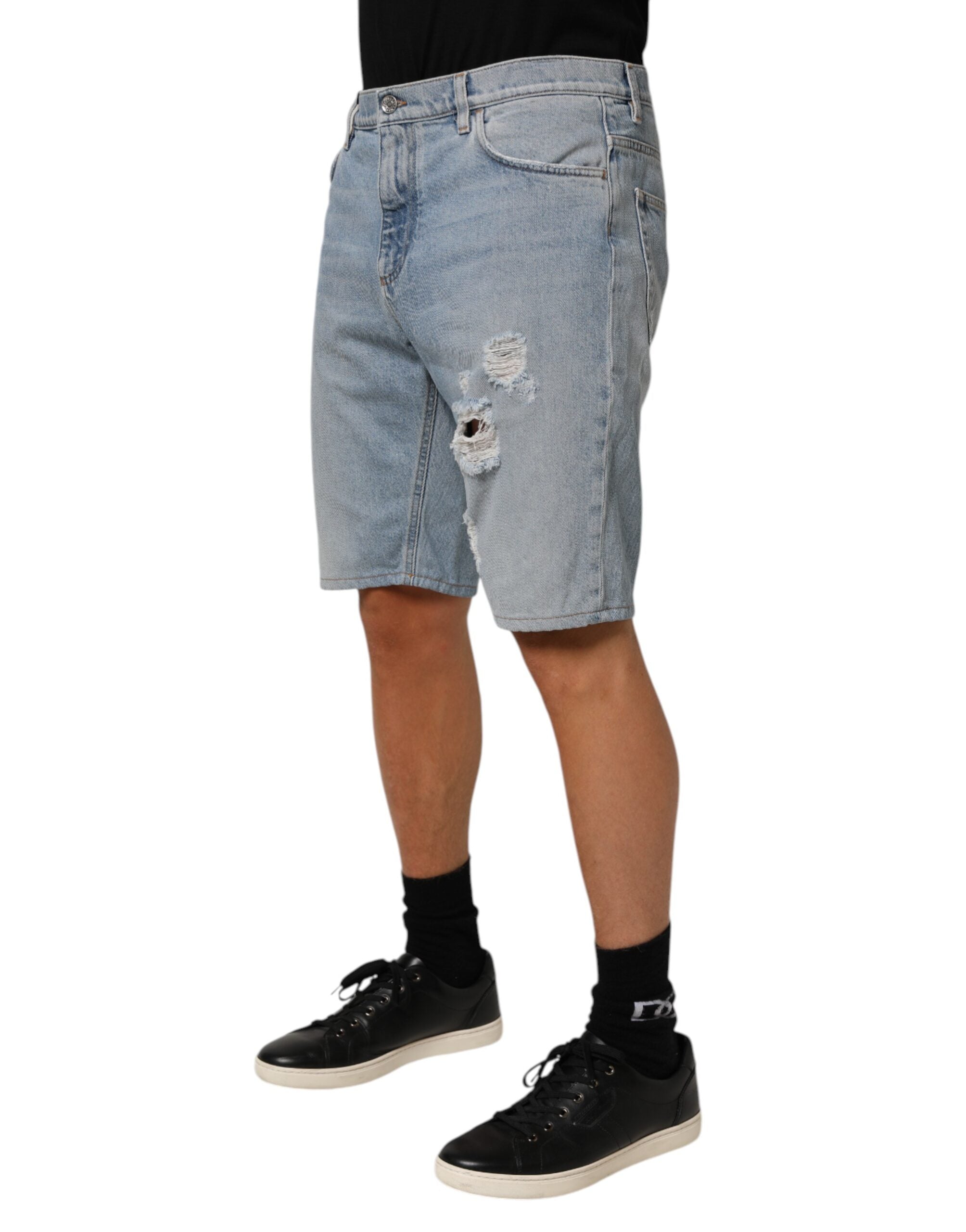 Shorts bermuda en denim blanc cassé Dolce & Gabbana en coton déchiré, style décontracté et tendance.