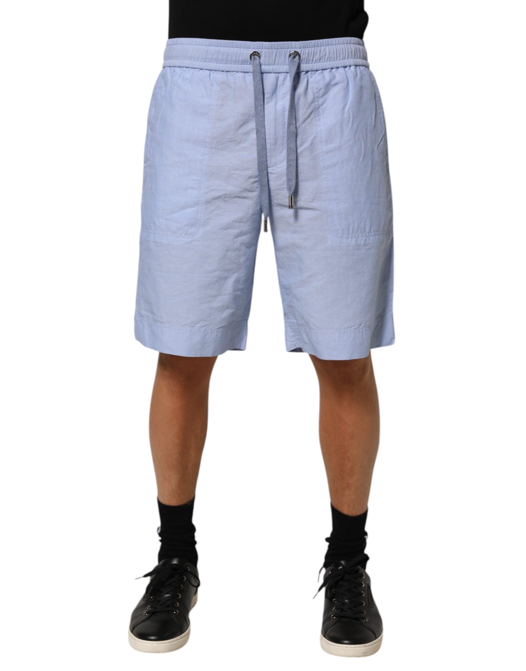 Shorts bermuda en lin pour homme Dolce & Gabbana Light Blue, mi-hauteur, style décontracté, visible en couleur bleu clair.