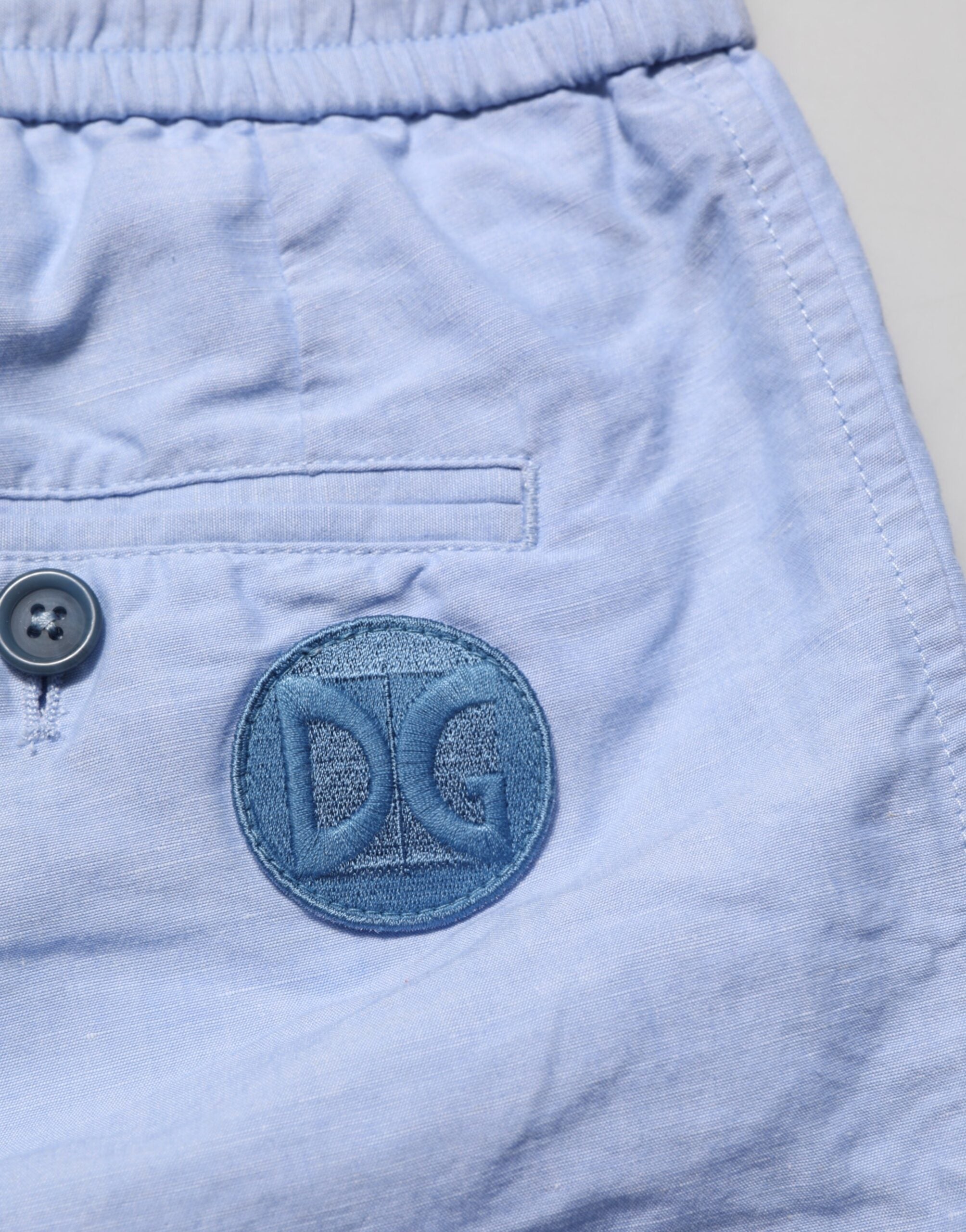 Shorts bermuda en lin pour homme Dolce & Gabbana Light Blue, taille mi-haute, look décontracté et élégant.