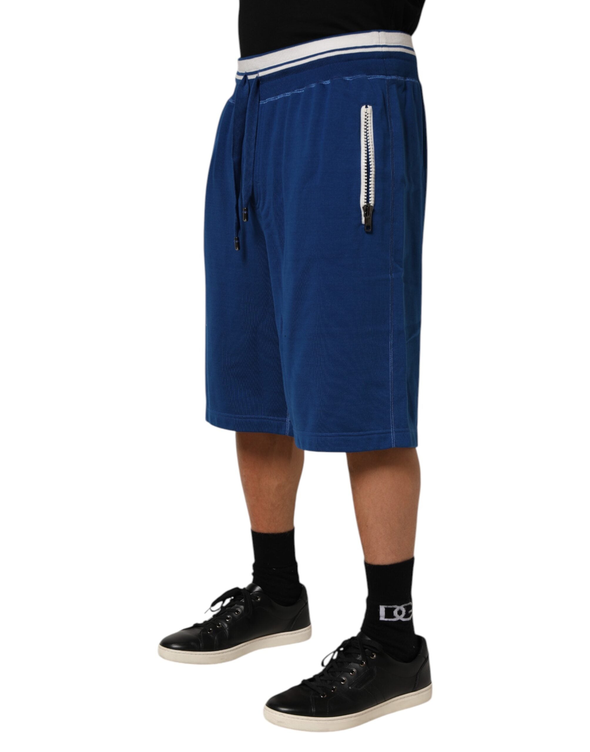 Shorts Bermuda Dolce & Gabbana en coton mélangé bleu, style décontracté avec logo visible.