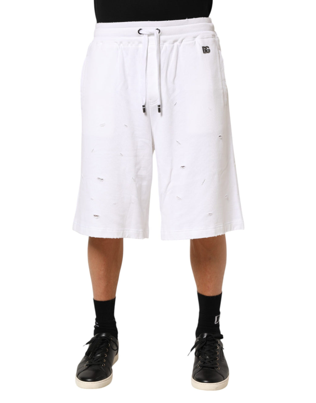 Shorts bermuda en coton blanc de Dolce & Gabbana avec déchirures, style décontracté et tendance.