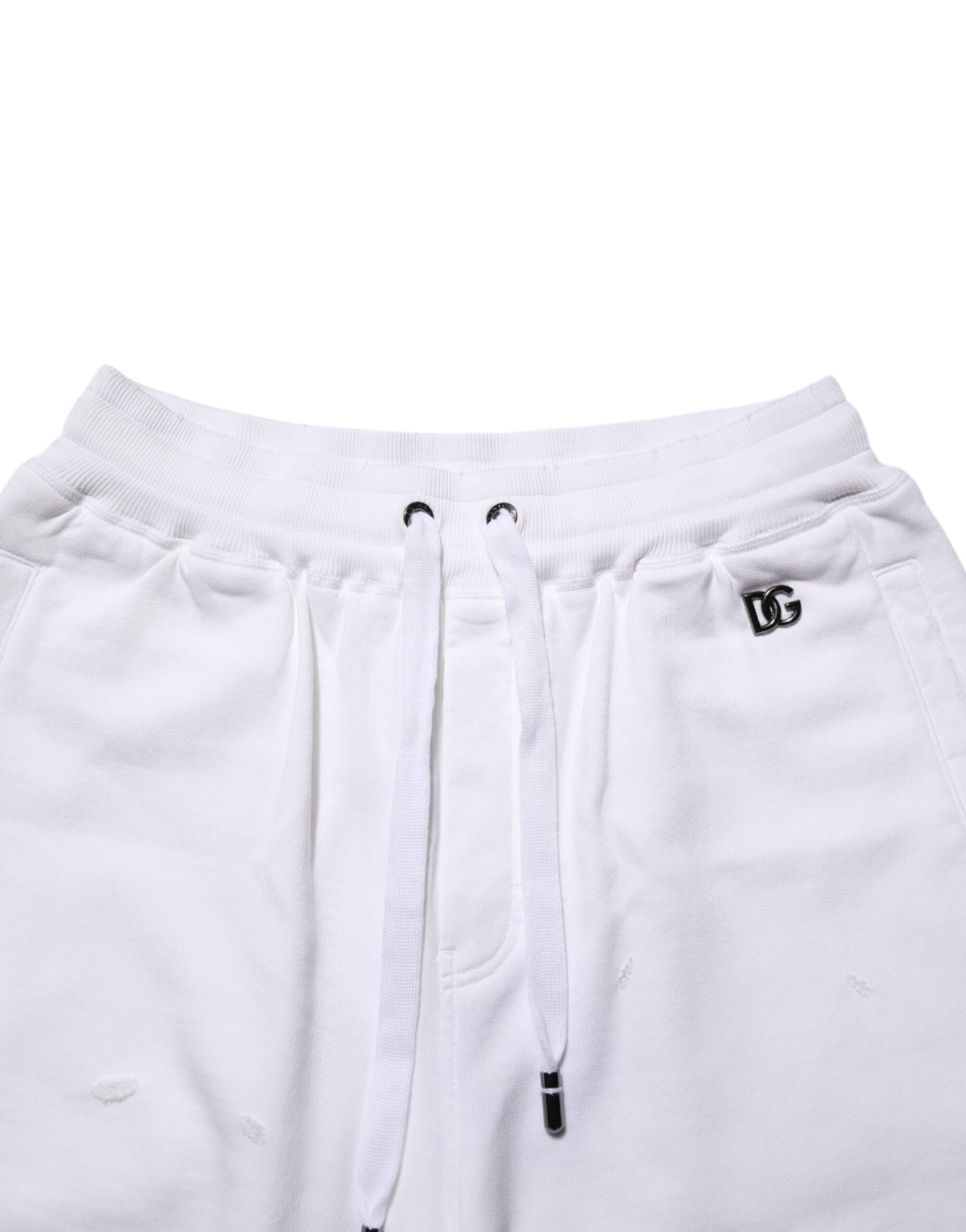 Shorts Bermuda en coton blanc Dolce & Gabbana avec déchirures, style décontracté et tendance pour un look moderne.