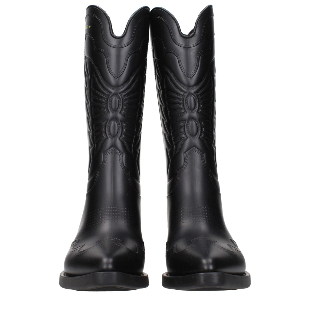 Bottes en coton noir Christian Dior, style élégant, avec détails sophistiqués, parfaites pour un look chic et moderne.