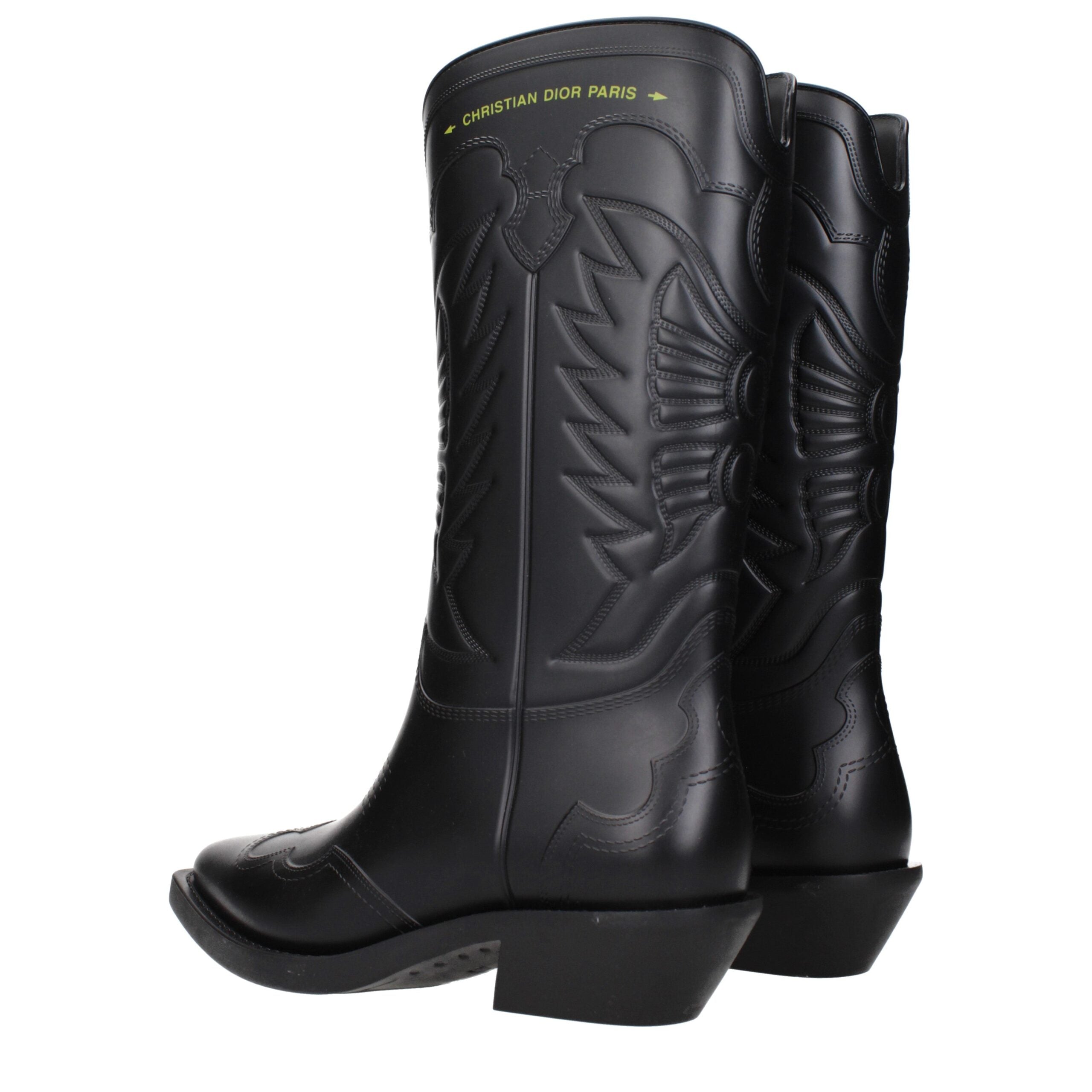 Bottes en coton noir Christian Dior avec semelle épaisse et design élégant, vue de face sur fond neutre.
