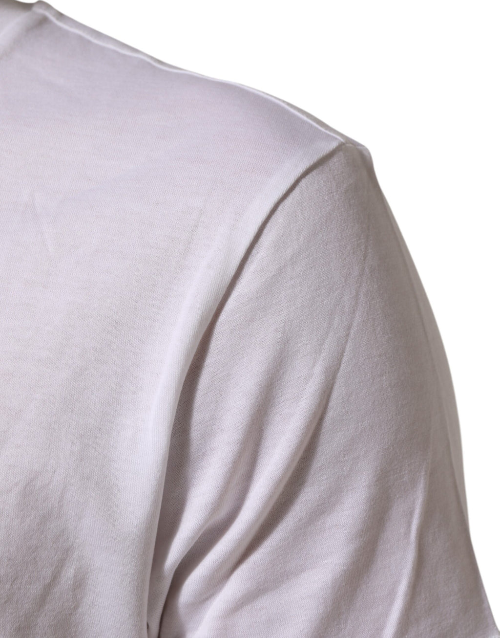 T-shirt blanc en coton Dolce & Gabbana avec logo imprimé et col rond visible sur l'image.