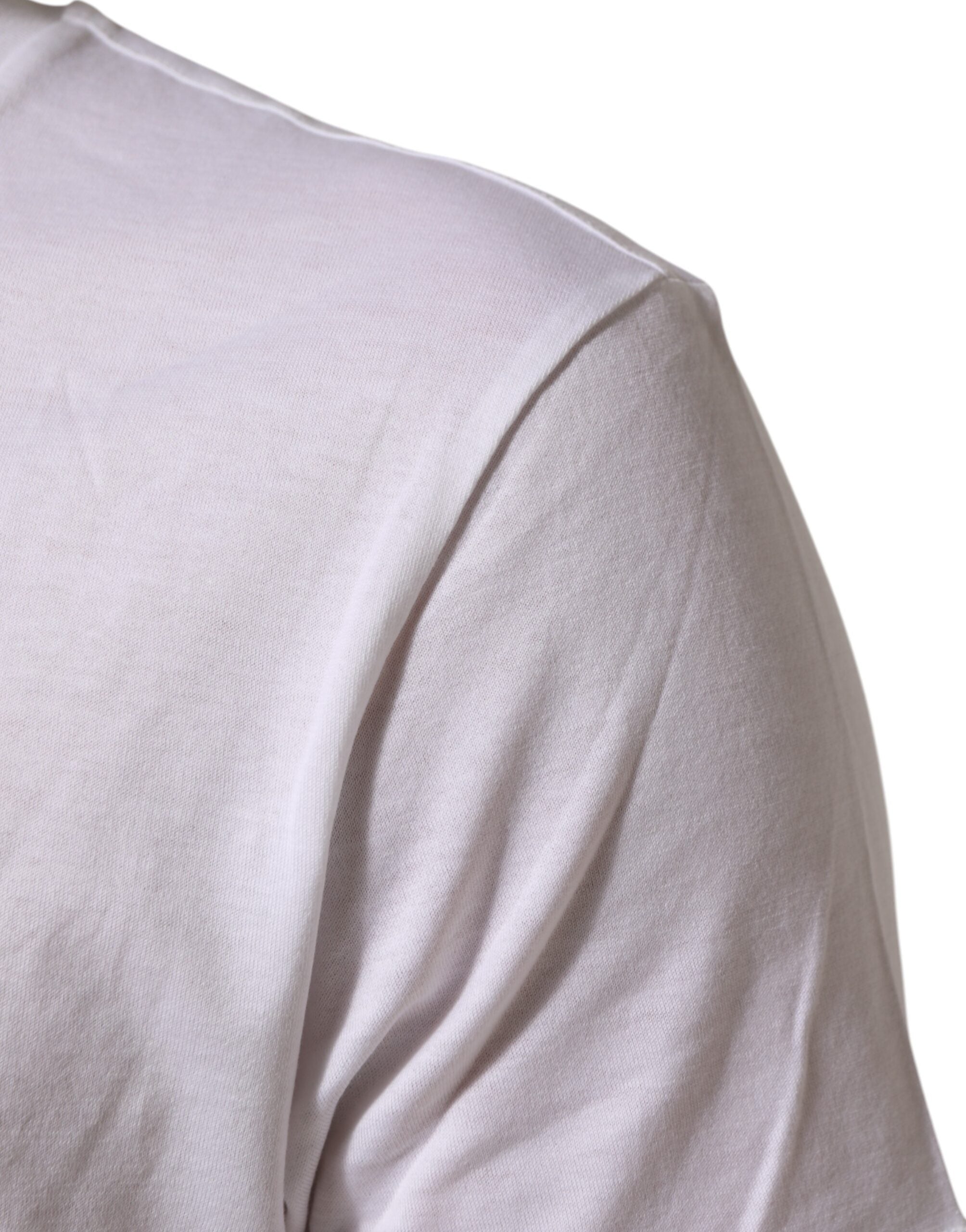 T-shirt blanc en coton Dolce & Gabbana avec logo imprimé et col rond visible sur l'image.