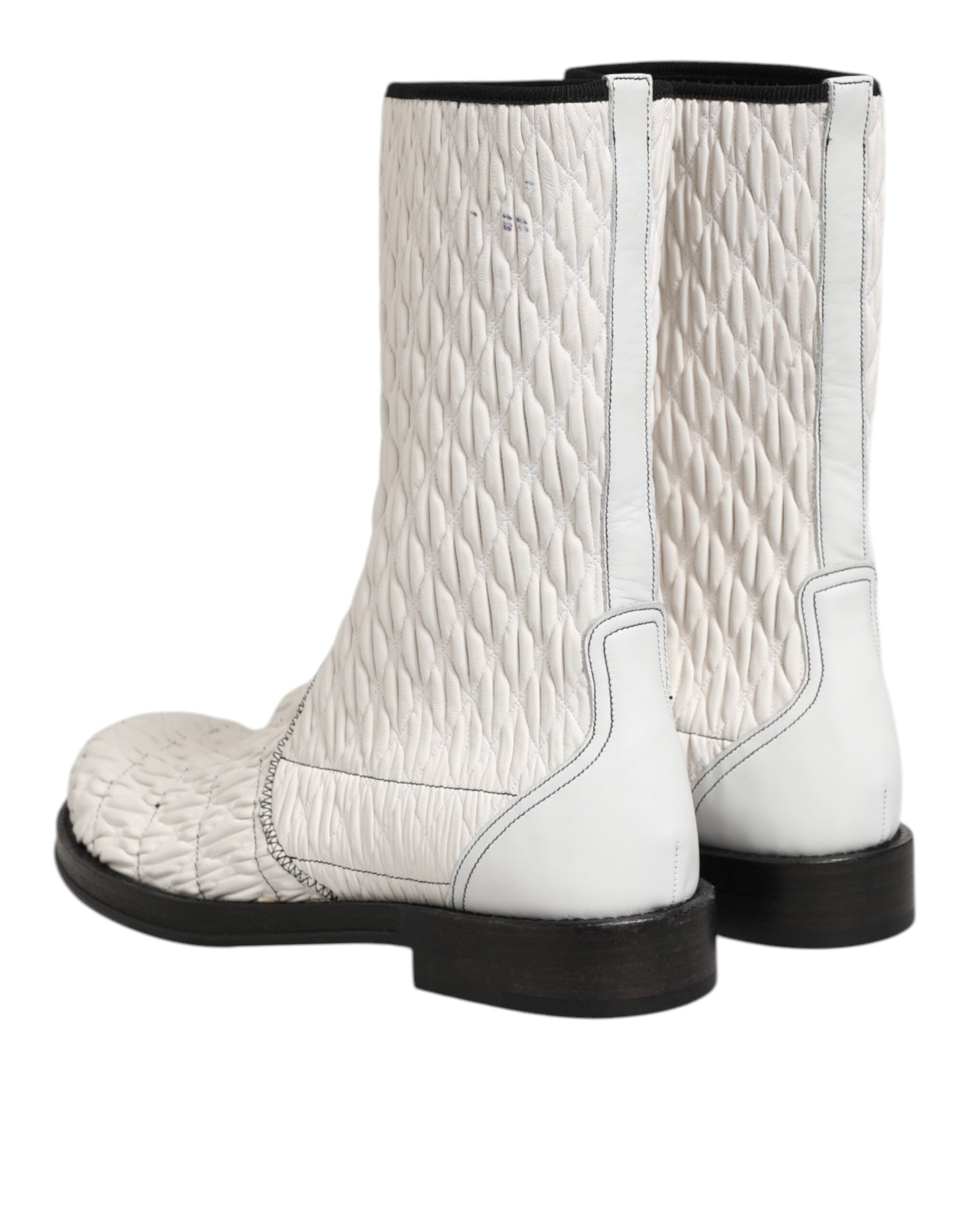 Bottes en cuir d’agneau blanc Dolce & Gabbana, mi-mollet, avec design élégant et finition lisse.