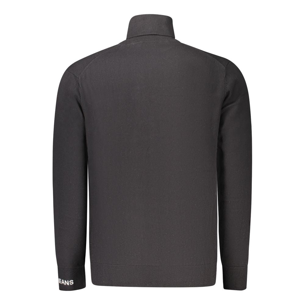 Pull homme en coton noir Pepe Jeans, modèle à col rond et manches longues, aspect doux et confortable.