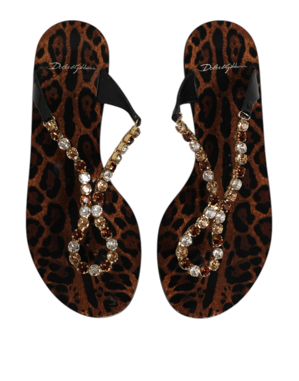 Sandales plates noires Dolce & Gabbana avec cristaux, parfaites pour la plage et le look décontracté élégant.